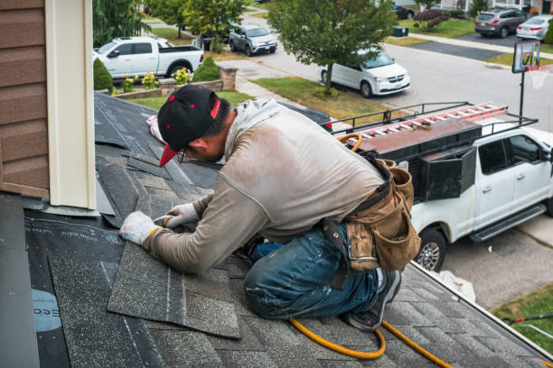 Professional Emergency Roof Repair technician working in Needham, IN